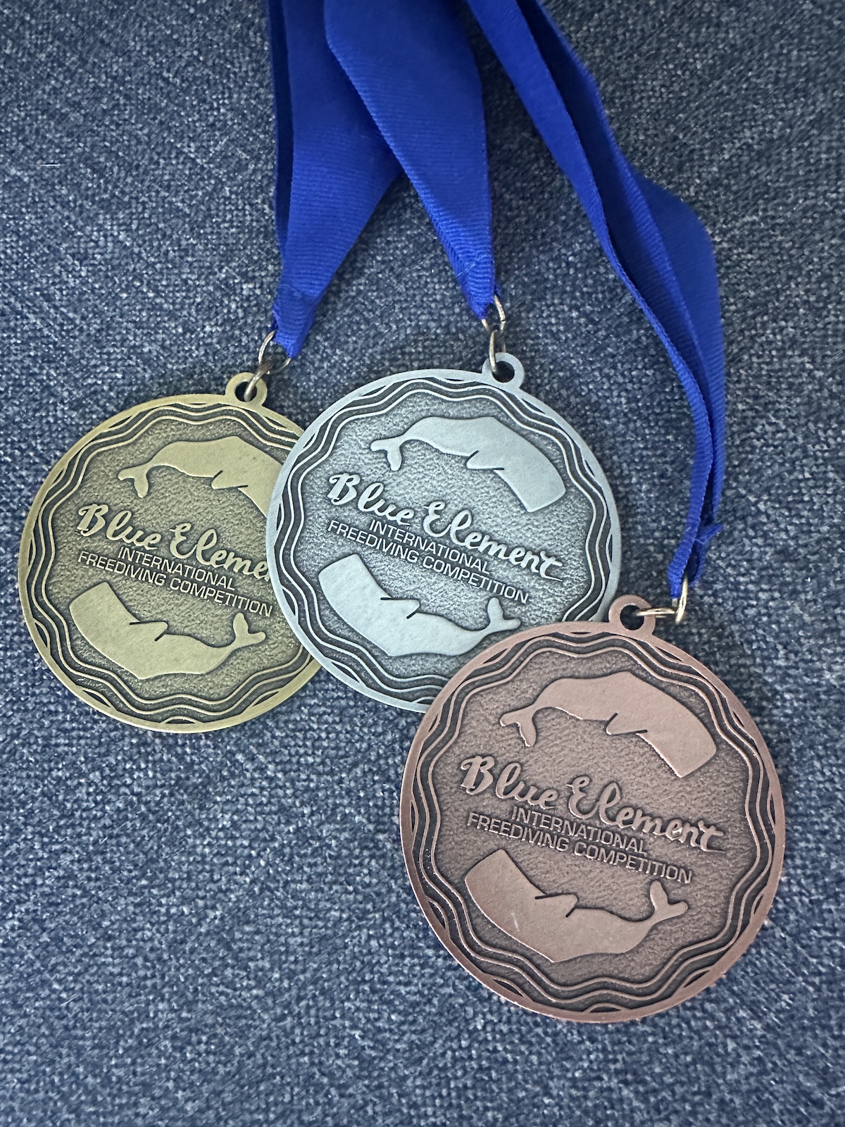 Blue Element gold, silver and bronze competition medals