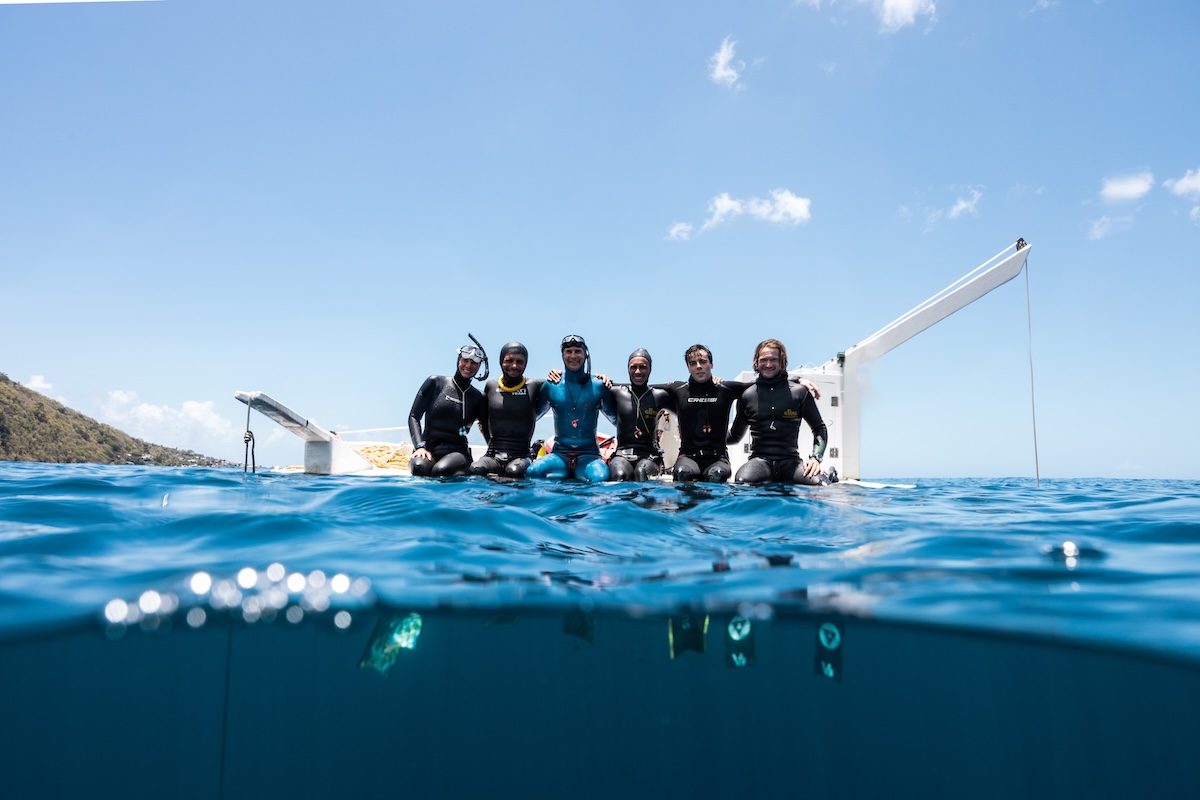 The Blue Element team on the platform between dives in Soufrière Bay